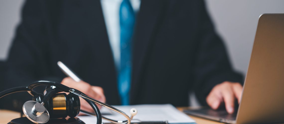 A personal injury lawyer holds the authority in law to guide clients toward a just decision, wielding the gavel of justice.